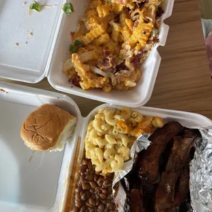 Ribs w Mac and cheese and baked beans and a roll $25 Pastrami fries $13