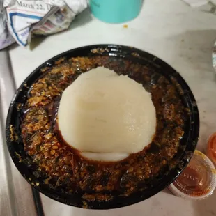 Egusi soup and fufu plantain