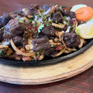 Goat sekuwa! So good!!! Tender and juicy. Wow. We also got momo's which were so good too.