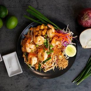 Another version of Phad Thai! Stir-fried bean thread noodles, prawns, bean sprouts, chive, scallion, and egg in Phad Thai sauce. Garnished w
