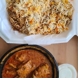 Chicken biryani and karahi chicken, came with two yogurt sauces