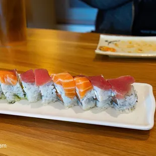 a plate of sushi on a table