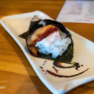a plate of sushi on a table
