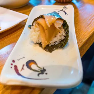 a plate of sushi on a table