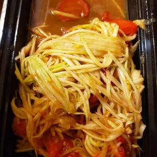 a bowl of noodles and vegetables