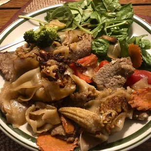 Pad Kee Mao Noodle with beef ( with spinach salad on the side). Delicious, a fancier version of Pad se ew...