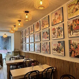 a dining area with tables and chairs