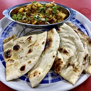 Khasiyat Indian Cuisine, Cauliflower Pea Potatoe Curry 16oz $12.99 w/ Garlic Naan $3.99
