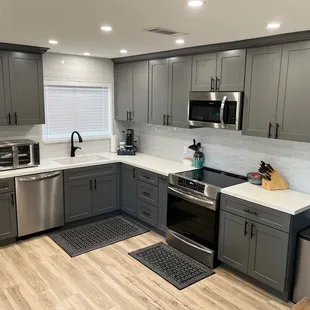 New cabinets, countertops, backspace, appliances.. the whole works!