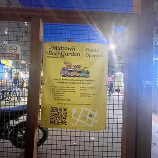 a sign in a fenced in area