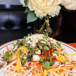 Mango salad with squid and shrimp