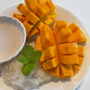 Sticky Rice Mango, Sweet sticky rice drenched coconut milk with fresh mango topped toasted mung bean.