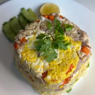 Thai fried rice with minced crab meat, onions, scallion, peas, carrots and egg.