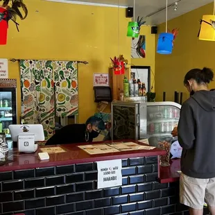 a man standing at the counter