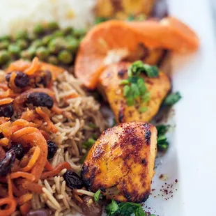 Free-Range Chicken Kabob with Qabuli Palao (Basmati Rice browned and topped with seared carrots &amp; raisins)