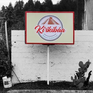 a sign on the side of a building