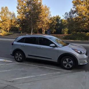Our new silky silver 2019 Niro. I get ~70 mpg on a brutal 2 hr commute, but smart cruise control and Android auto functions keep me sane!