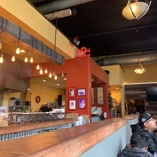 View to the kitchen and restroom hallway.