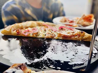 Buzzo’s Wood Fired Pizza