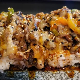 Philly cheese steak roll - kind of odd having that on top of a California Roll. But the Philly mixture itself was good.