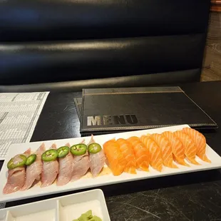 Seared tuna Nigiri on the left. (not good, old tuna)