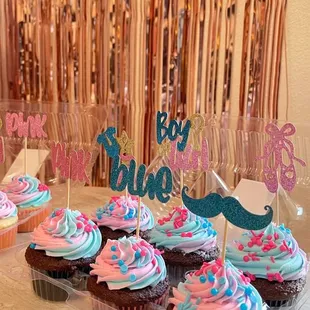 Chocolate cupcakes with custom filling.  PS: toppers not included