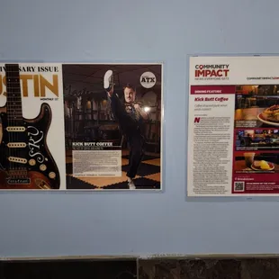 a man with a guitar and a magazine