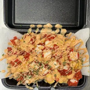 Hot cheeto Build-A-Boat
(Loaded Fries with chick'n and queso mac n cheese)