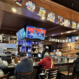 people sitting at the bar
