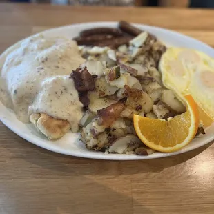 COUNTRY PLATTER Two biscuits and gravy, three eggs, home fries, * Sausage Links