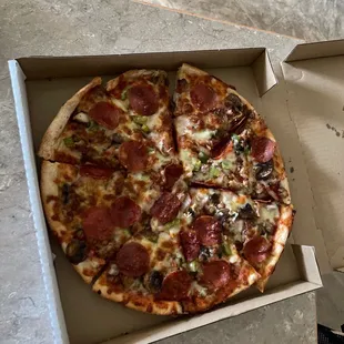 Supreme pizza and baked spaghetti