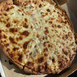 Cheese pizza add ricotta. Delicious!