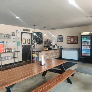 a wooden table and benches