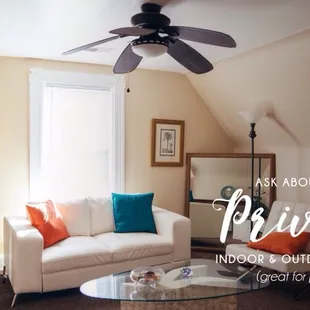 a living room with a ceiling fan