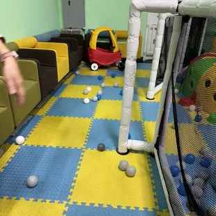 Balls that toddlers played with that were out of the ball pit