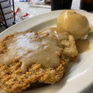 Chicken fried steak and mashed potatoes