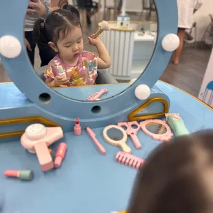 Cutie playing make believe!