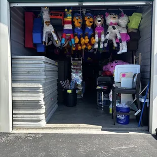 Piñatas, tables, chairs, balloons and party supplies. The store has been moved to a storage. Please call before coming