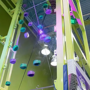 With stretching arms and grasping hands, kids can navigate up and down or side to side under the watchful eye of Kids Quest teammates.