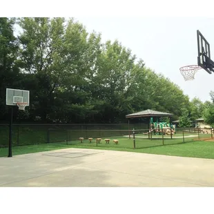 Basketball court for our school agers.  The 4 yr old playground in the background.