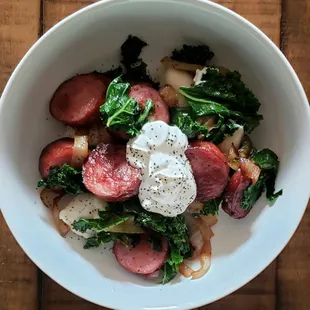 Our dinner at home using Sauerkraut and Ruskie (farmers cheese) pierogies, and a kielbasy variety from the case. Everything was delicious!