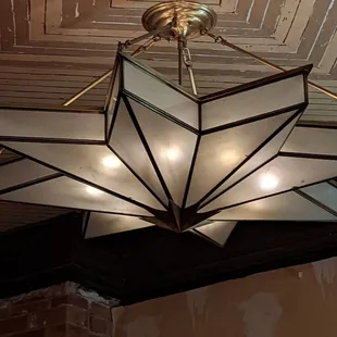 a chandelier hanging from the ceiling