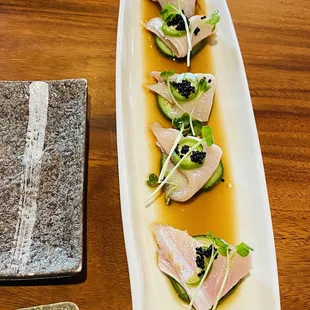 A1. Hamachi Carpaccio