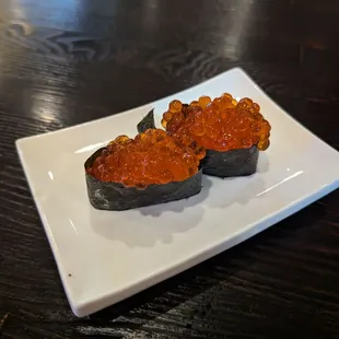 Ikura (salmon roe) nigiri.