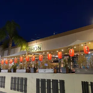 the outside of a restaurant at night