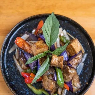 a plate of stir fried vegetables