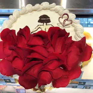 8 inch Vanilla Cake with Lady Rose Design. Perfect for your Valentine. Limited supply. Please call to place your order !