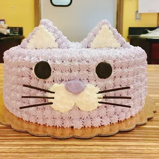 Purple Kitty Custom Cake. Colors can be customized based on your preferences. Please call or come into the store to place and order.