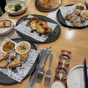 Pork and mushroom gyoza in the back. Jackfruit and chicken karaage. The fish special. Napa Caesar salad in the back left.