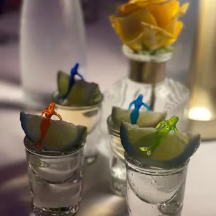 a close up of a flower in a glass